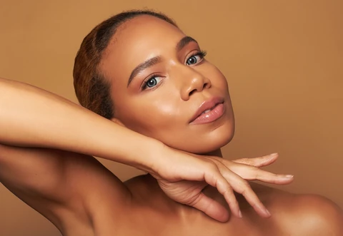 Daisi Jo — beauty portrait with hands framing her face