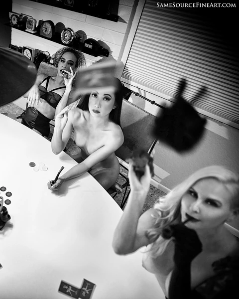 No Interruptions — black-and-white group editorial with Daisi Jo at a makeup table