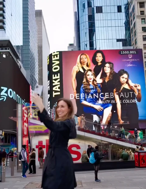 Defiance Beauty campaign featuring Daisi Jo on a billboard in Times Square, New York City